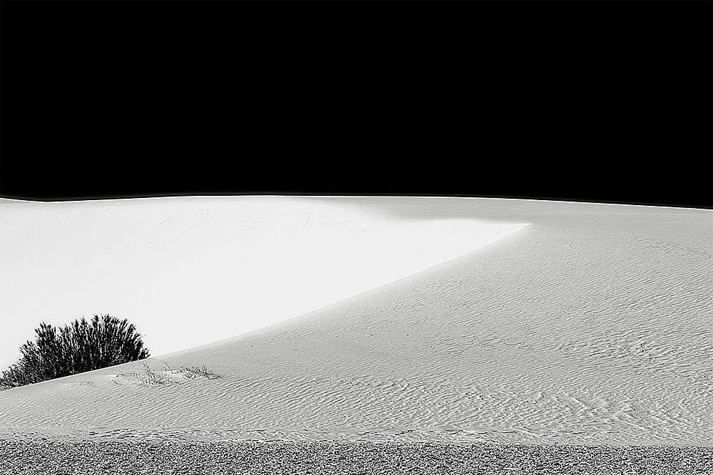 White Sands And Black Skies